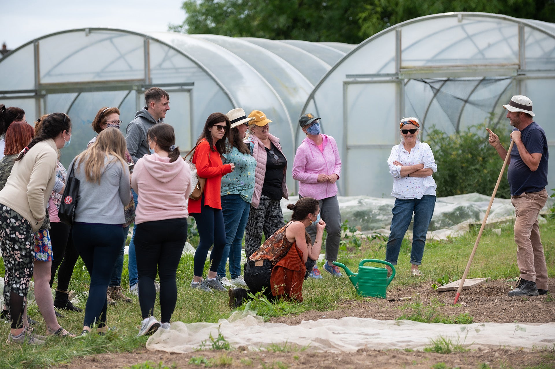 Group of teachers listening to Richard in the garden at GROW HQ on the 'how to create a school garden' teacher training course