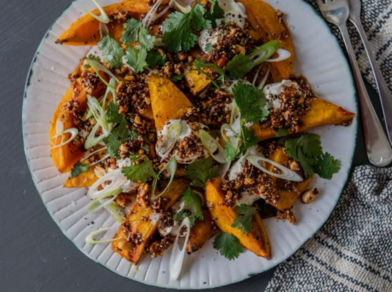 Pumpkin With Crème Fraiche, Peanut Rayu, Coriander & Spring Onion