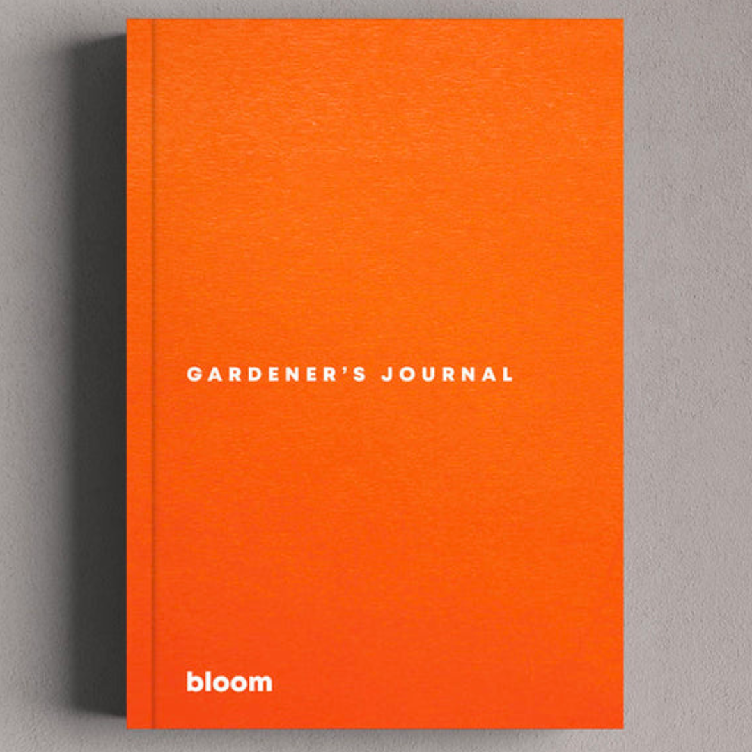 Orange garden journal on grey background