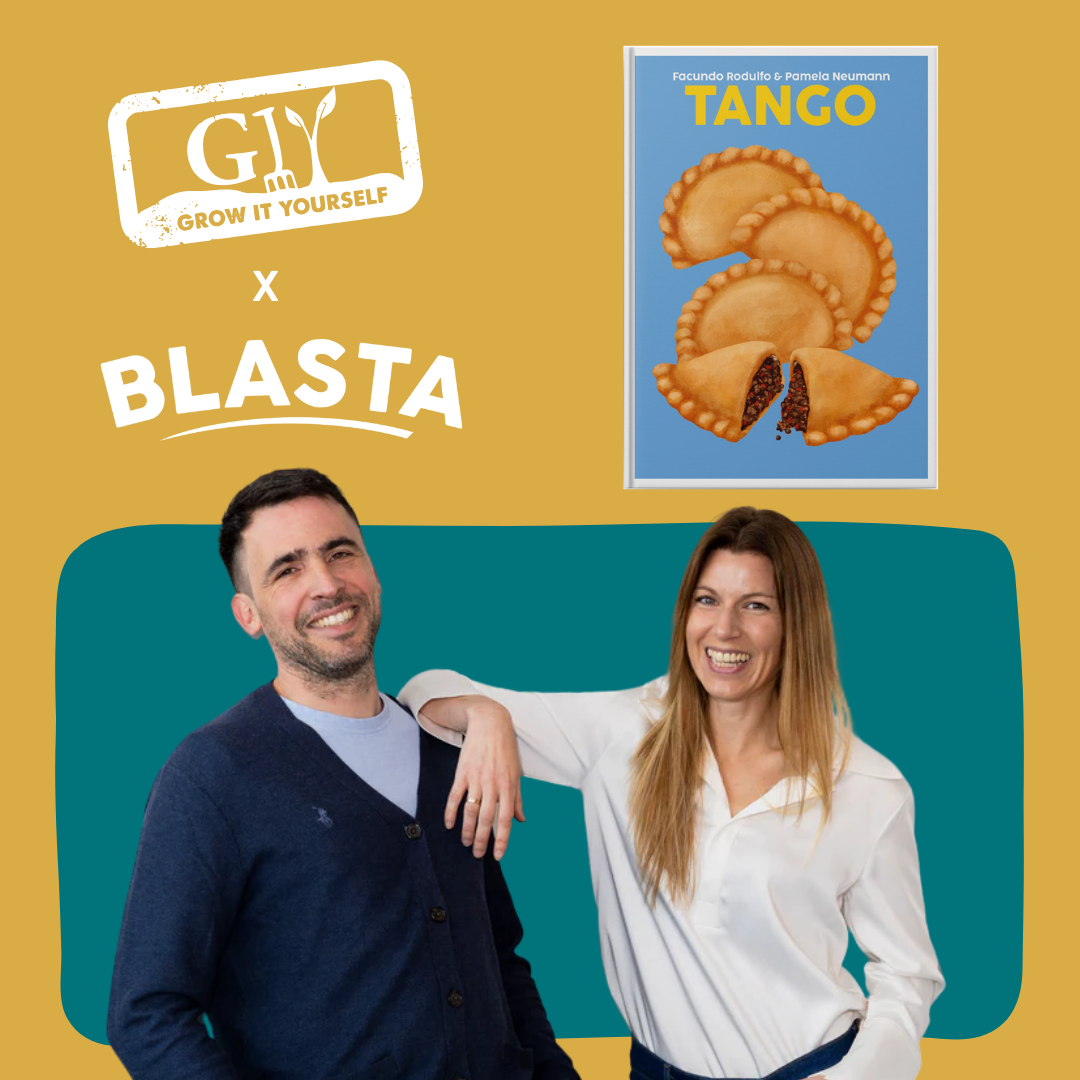 Pamela Neumann and Facundo Rodulfo smiling in front of the Tango cookbook cover for their Blasta supper club at GROW HQ, part of the GIY x Blasta series.
